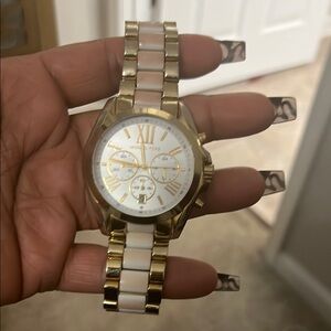 Michael Kors Gold/White Chronograph Watch discoloration on the white part